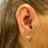 female ear rings for migraine patients