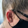 women ear piercing for anxiety solution